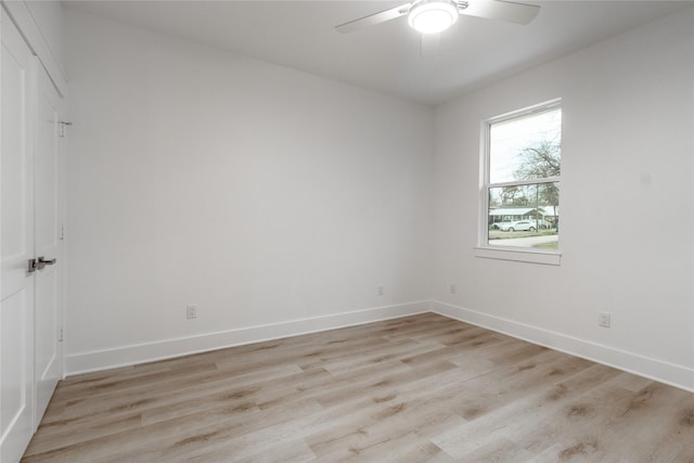 216 Pauline St, Arp, TX 75750 - unfurnished room featuring light wood-style floors, ceiling fan, and baseboards