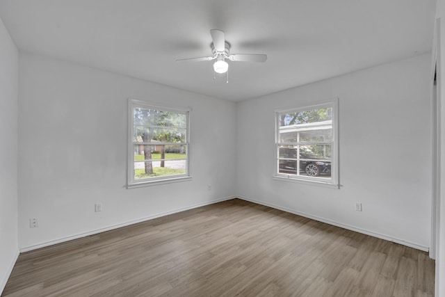 329 Worthy St, Saginaw, TX 76179 - spare room featuring plenty of natural light, wood finished floors, and a ceiling fan