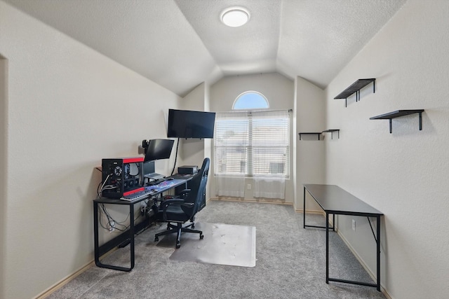 7113 Creighton Ct, Fort Worth, TX 76120 - carpeted office space featuring vaulted ceiling, a textured ceiling, and baseboards