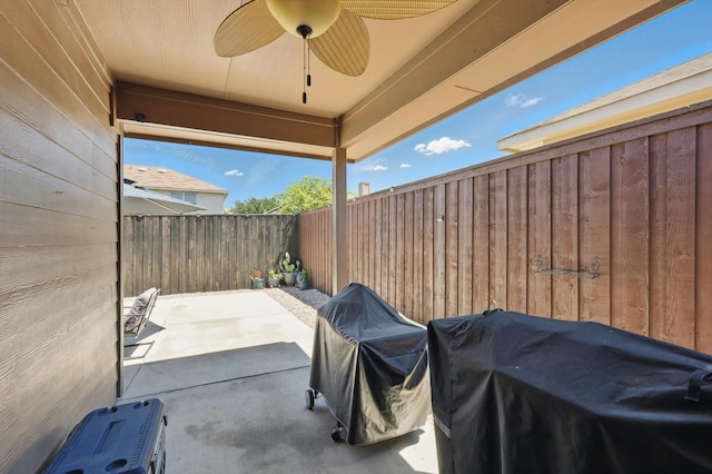 7113 Creighton Ct, Fort Worth, TX 76120 - fenced backyard with a ceiling fan, a grill, and a patio area