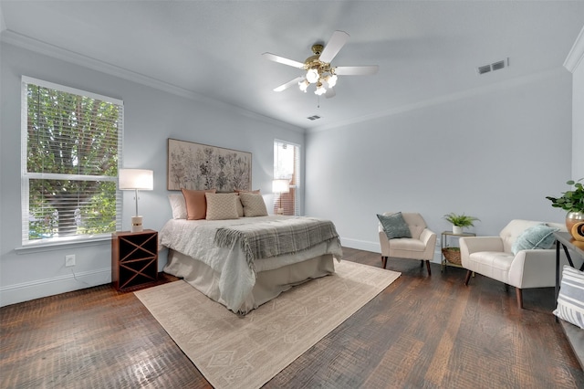 1102 Mccormick St, Garland, TX 75040 - bedroom with crown molding, baseboards, wood finished floors, and ceiling fan