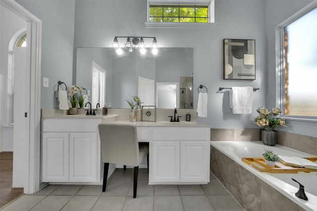 1102 Mccormick St, Garland, TX 75040 - bathroom with a bath, tile patterned flooring, vanity, and a shower stall
