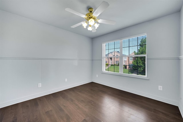 1102 Mccormick St, Garland, TX 75040 - empty room featuring wood finished floors, ceiling fan, and baseboards