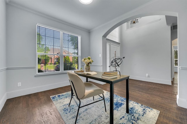 1102 Mccormick St, Garland, TX 75040 - office area featuring arched walkways, crown molding, dark wood-type flooring, and baseboards