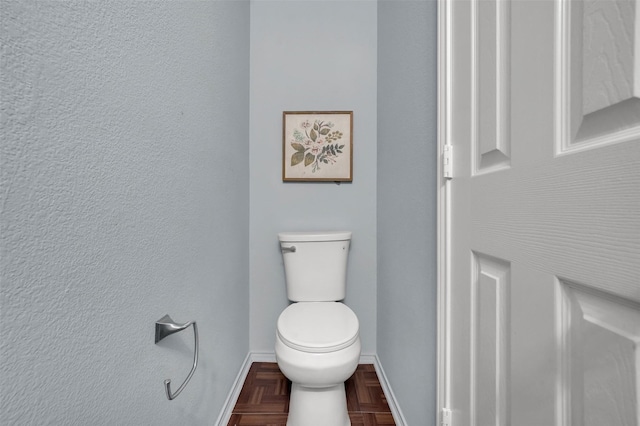 1102 Mccormick St, Garland, TX 75040 - bathroom with baseboards and toilet