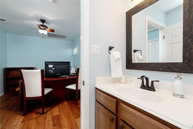 5798 Antique Rose Trl, Fairview, TX 75069 - bathroom with wood finished floors, a ceiling fan, and vanity