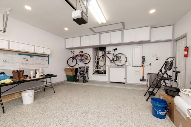 5798 Antique Rose Trl, Fairview, TX 75069 - garage featuring a garage door opener, recessed lighting, and baseboards