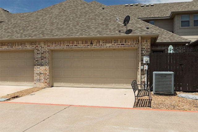 5798 Antique Rose Trl, Fairview, TX 75069 - garage with cooling unit and driveway