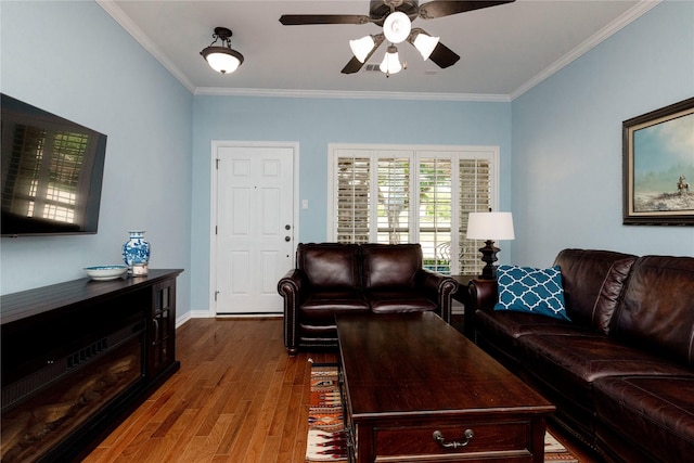 5798 Antique Rose Trl, Fairview, TX 75069 - living area with wood finished floors, crown molding, ceiling fan, and baseboards