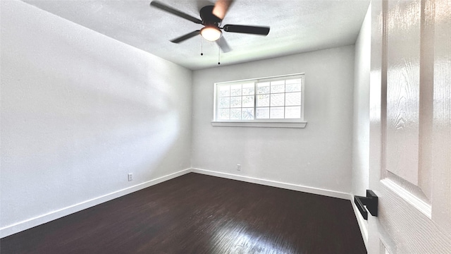 3315 Cedarcroft Ln, Dallas, TX 75233 - unfurnished room featuring dark wood-style flooring, baseboards, and a ceiling fan