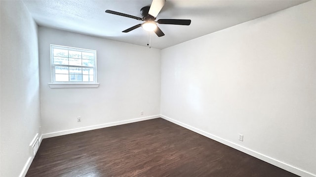 3315 Cedarcroft Ln, Dallas, TX 75233 - unfurnished room with dark wood finished floors, baseboards, and a ceiling fan