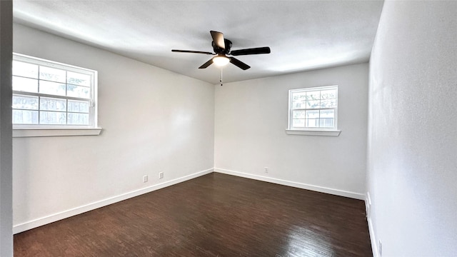 3315 Cedarcroft Ln, Dallas, TX 75233 - unfurnished room with dark wood-style flooring, baseboards, and a ceiling fan