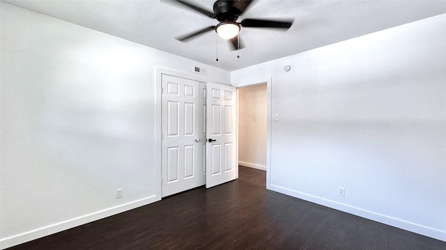 3315 Cedarcroft Ln, Dallas, TX 75233 - unfurnished bedroom with dark wood finished floors, baseboards, and a ceiling fan