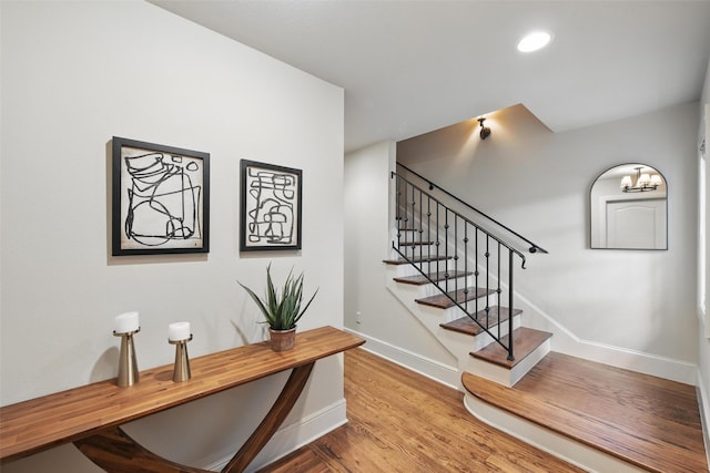 261 Casa Blanca Ave, Fort Worth, TX 76107 - stairway featuring baseboards, wood finished floors, and recessed lighting