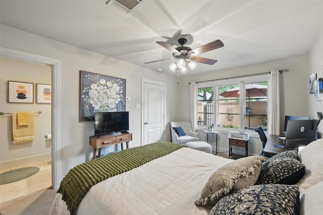 261 Casa Blanca Ave, Fort Worth, TX 76107 - tiled bedroom with baseboards, ensuite bathroom, and ceiling fan