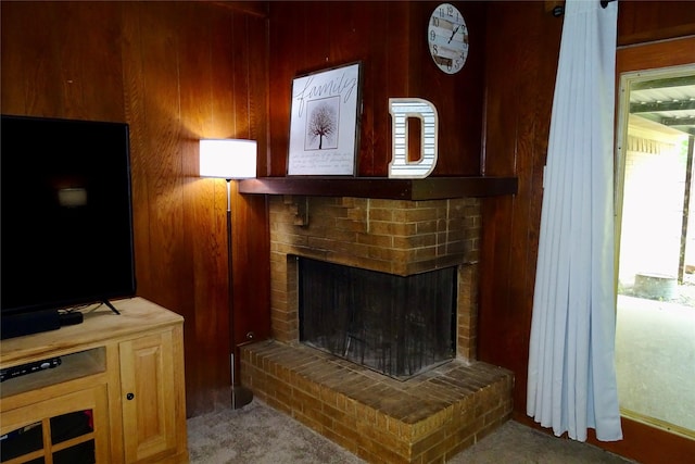 212 E Kearney St, Mesquite, TX 75149 - detailed view of carpet floors, wood walls, and a fireplace