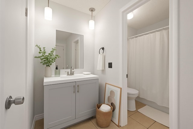 3231 Rockne Ln, Mesquite, TX 75150 - full bathroom featuring toilet, vanity, tile patterned flooring, and a shower with curtain