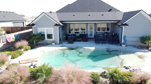 10116 T Bury Ln, Waco, TX 76708 - back of house with a patio and outdoor lounge area