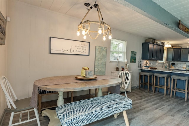 166 Ocean Dr, Gun Barrel City, TX 75156 - dining area featuring light wood-style floors, a chandelier, ornamental molding, and wooden ceiling