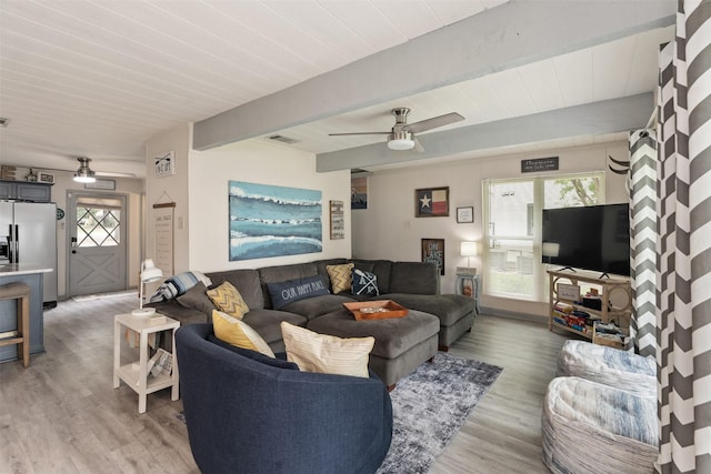 166 Ocean Dr, Gun Barrel City, TX 75156 - living area with a ceiling fan, light wood-type flooring, healthy amount of natural light, and beamed ceiling