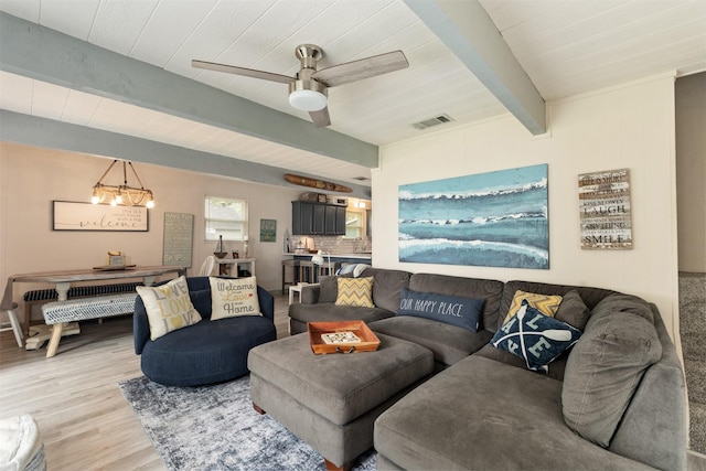 166 Ocean Dr, Gun Barrel City, TX 75156 - living area featuring beam ceiling, light wood-style floors, a chandelier, and ceiling fan