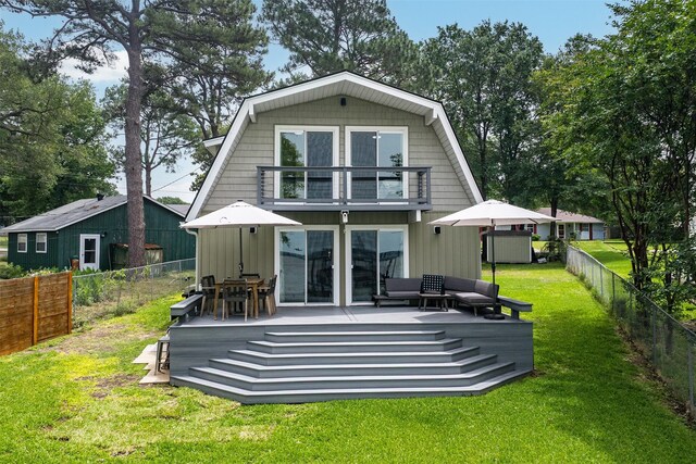 166 Ocean Dr, Gun Barrel City, TX 75156 - rear view of house with a balcony, a fenced backyard, and a deck