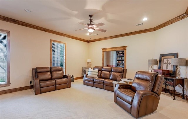 121 Big Jake Ct, Weatherford, TX 76088 - living area featuring ornamental molding, light carpet, ceiling fan, and plenty of natural light