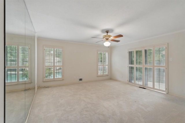 6 Shenandoah Pl, Richardson, TX 75080 - carpeted empty room with ornamental molding, healthy amount of natural light, a ceiling fan, and baseboards