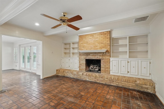 6 Shenandoah Pl, Richardson, TX 75080 - unfurnished living room with baseboards, crown molding, ceiling fan, brick floors, and a fireplace