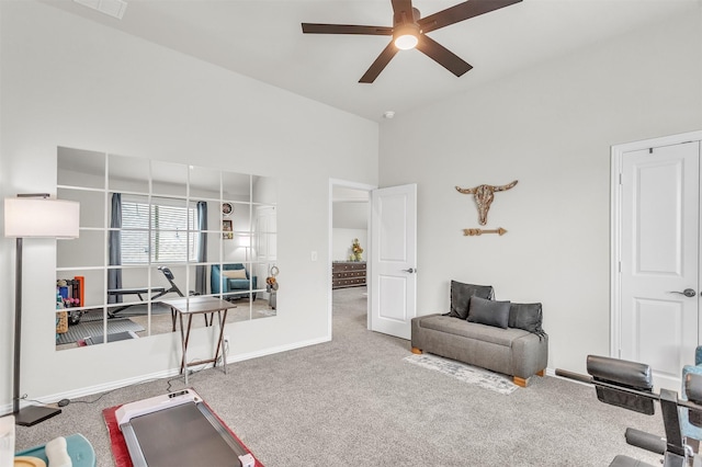 4444 Blue Mist Dr, Fort Worth, TX 76036 - workout room featuring carpet flooring, a ceiling fan, baseboards, and a towering ceiling