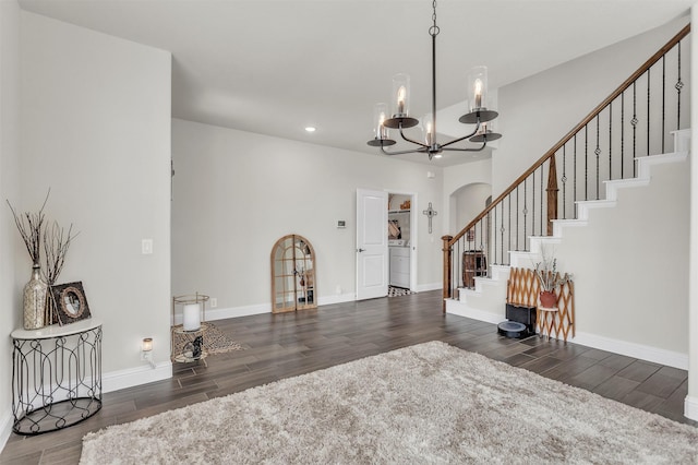 4444 Blue Mist Dr, Fort Worth, TX 76036 - foyer featuring wood finished floors, a chandelier, recessed lighting, stairs, and arched walkways