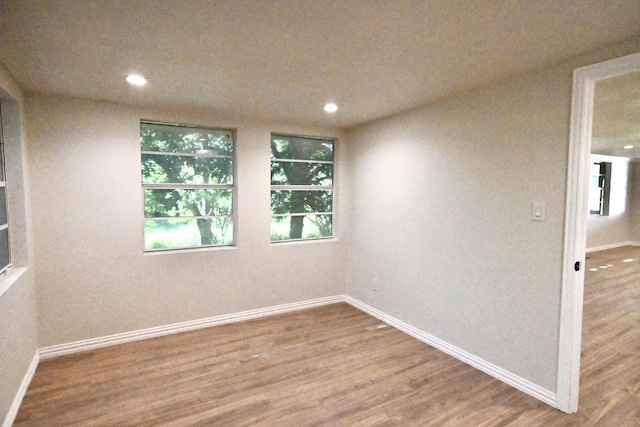 220 Seabreeze Dr, Gun Barrel City, TX 75156 - empty room featuring wood finished floors, baseboards, and recessed lighting