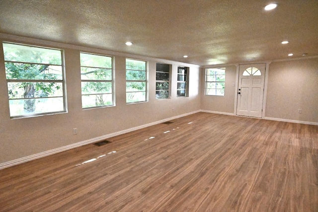220 Seabreeze Dr, Gun Barrel City, TX 75156 - entrance foyer with wood finished floors, recessed lighting, and baseboards