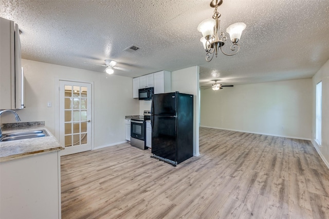 110 Muleta Dr, Oak Point, TX 75068 - kitchen with black appliances, a ceiling fan, a sink, light wood-type flooring, and a textured ceiling