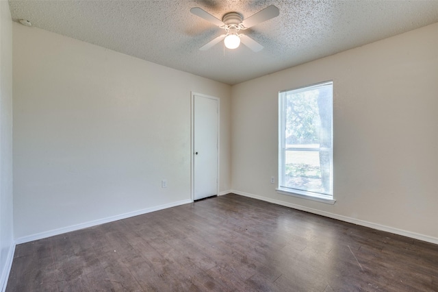 110 Muleta Dr, Oak Point, TX 75068 - empty room with a textured ceiling, dark wood-style flooring, ceiling fan, and baseboards
