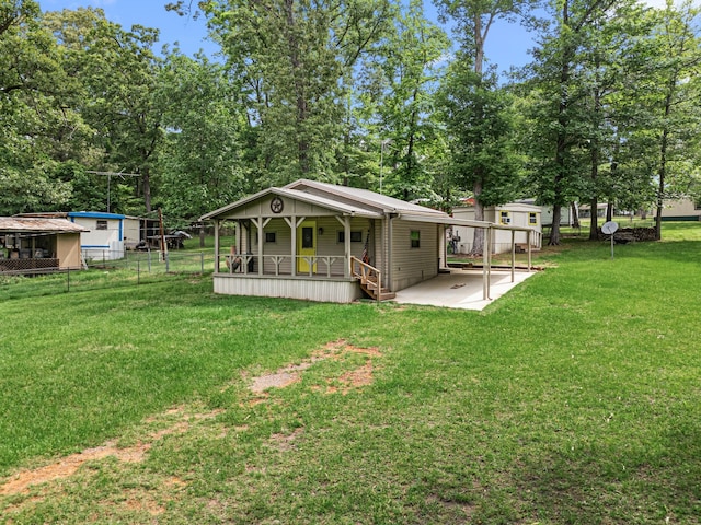 150 David St, Jefferson, TX 75657 - back of house with a porch