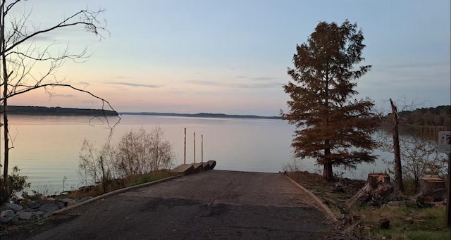 150 David St, Jefferson, TX 75657 - dock featuring a water view and a boat ramp
