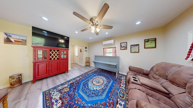 150 David St, Jefferson, TX 75657 - living area with a wall unit AC, ceiling fan, light wood-style flooring, recessed lighting, and baseboards