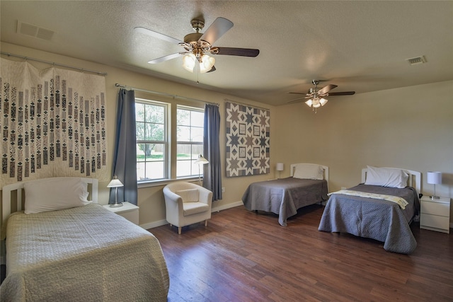6495 Smoky Hill Ct, Granbury, TX 76049 - bedroom featuring wood finished floors, baseboards, a ceiling fan, and a textured ceiling