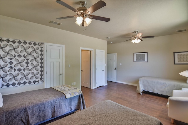 6495 Smoky Hill Ct, Granbury, TX 76049 - bedroom featuring wood finished floors, a ceiling fan, and baseboards