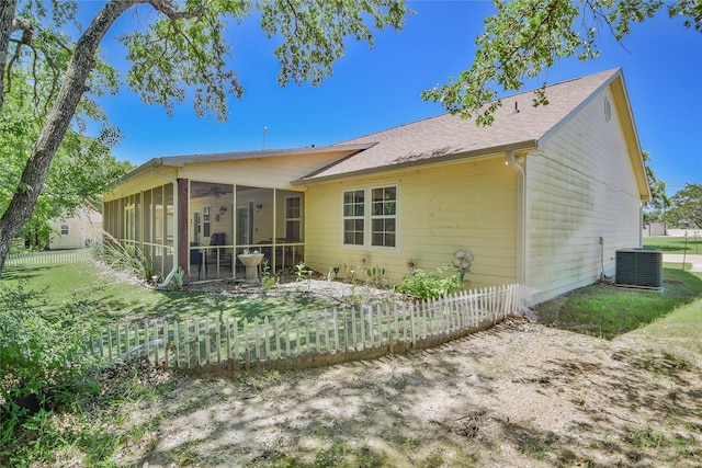6495 Smoky Hill Ct, Granbury, TX 76049 - back of property featuring a sunroom, cooling unit, a ceiling fan, and roof with shingles