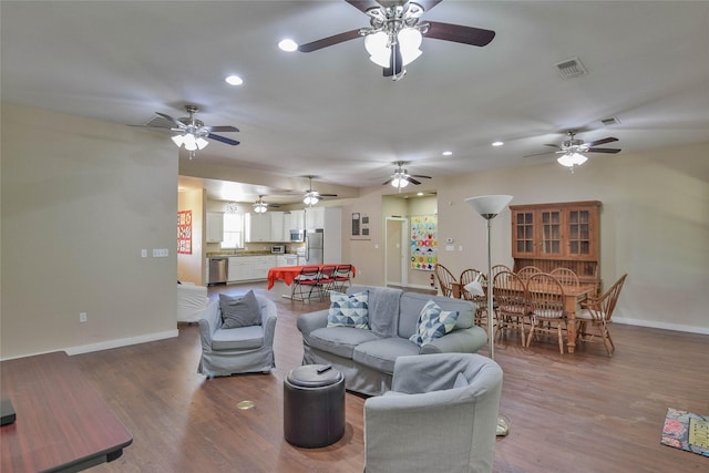6495 Smoky Hill Ct, Granbury, TX 76049 - living area featuring baseboards, recessed lighting, wood finished floors, and ceiling fan