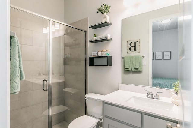 1704 Cypress Gap Trl, Mansfield, TX 76063 - bathroom with toilet, a stall shower, and vanity
