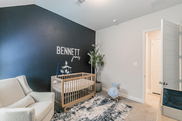 1704 Cypress Gap Trl, Mansfield, TX 76063 - carpeted bedroom featuring baseboards and a crib
