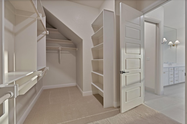 2113 Dicey Rd, Weatherford, TX 76085 - walk in closet featuring light carpet