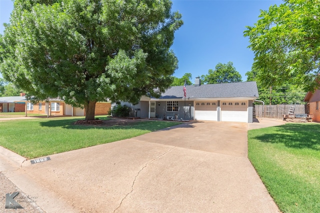 1602 Westwood Dr, Abilene, TX 79603 - view of front facade with an attached garage and concrete driveway