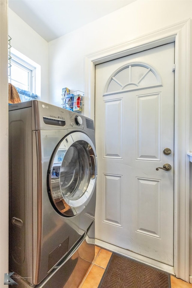 1602 Westwood Dr, Abilene, TX 79603 - washroom with washer / dryer and light tile patterned floors