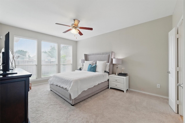 13165 Red Robin Dr, Fort Worth, TX 76244 - bedroom with light colored carpet, baseboards, and ceiling fan