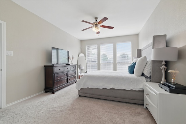 13165 Red Robin Dr, Fort Worth, TX 76244 - bedroom with light carpet, ceiling fan, and baseboards