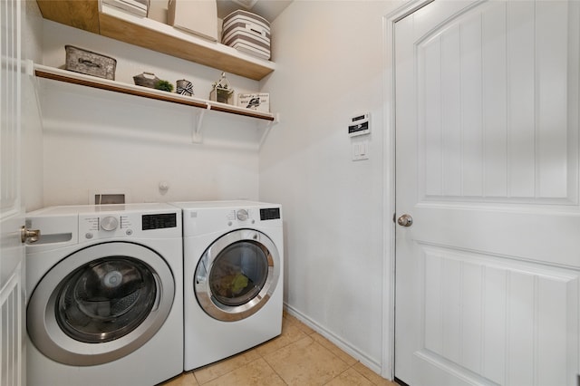 13165 Red Robin Dr, Fort Worth, TX 76244 - laundry room featuring washing machine and dryer, baseboards, and light tile patterned floors